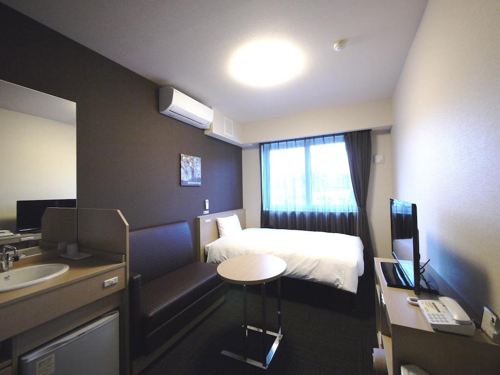 Hotel Route-Inn Томе Номер фото